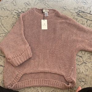 Three quarter sleeve knit sweater.